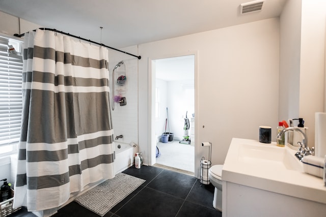 219 Waverly St, Highland Park, MI 48203 - bathroom featuring shower / bath combination with curtain, toilet, tile patterned flooring, and vanity