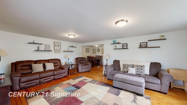 living room with wood finished floors