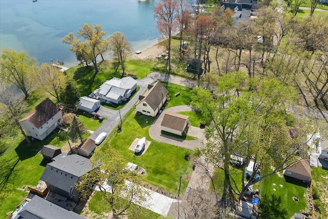 view of property location with nearby suburban area and a nearby body of water