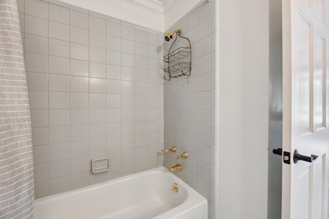 bathroom with shower / washtub combination and crown molding