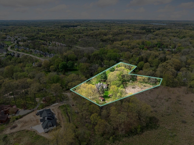 view of property location with a forest and property boundaries highlighted