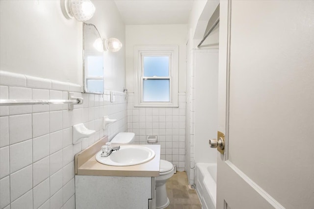 12855 Couwlier Ave, Warren, MI 48089 - full bathroom with toilet, tile walls, vanity, wainscoting, and shower / bathtub combination with curtain