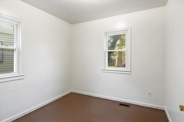 12855 Couwlier Ave, Warren, MI 48089 - unfurnished room with baseboards and wood finished floors