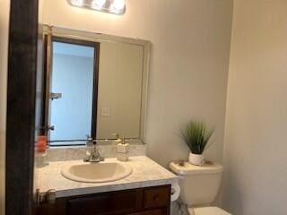 23004 Doremus St Unit 2, Saint Clair Shores, MI 48080 - bathroom featuring vanity and toilet