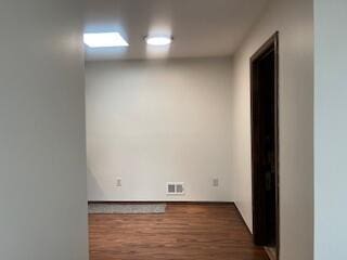 23004 Doremus St Unit 2, Saint Clair Shores, MI 48080 - empty room featuring dark wood finished floors
