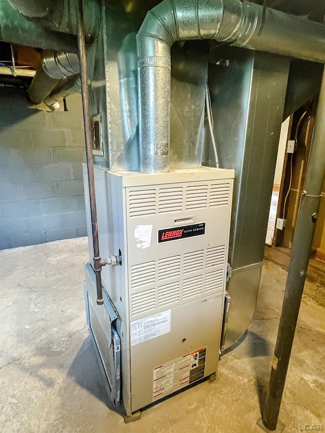 807 N St, Morenci, MI 49256 - utility room featuring heating unit