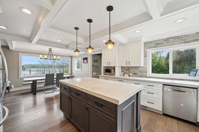 6481 Wardell, West Bloomfield, MI 48324 - kitchen featuring stainless steel appliances, light countertops, white cabinetry, a chandelier, and beamed ceiling