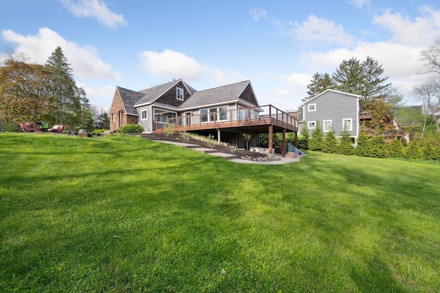 6481 Wardell, West Bloomfield, MI 48324 - back of property featuring a deck and a lawn