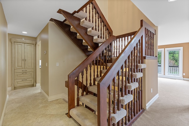 5215 Deer Run Cir, Orchard Lake, MI 48323 - staircase featuring baseboards, recessed lighting, and carpet