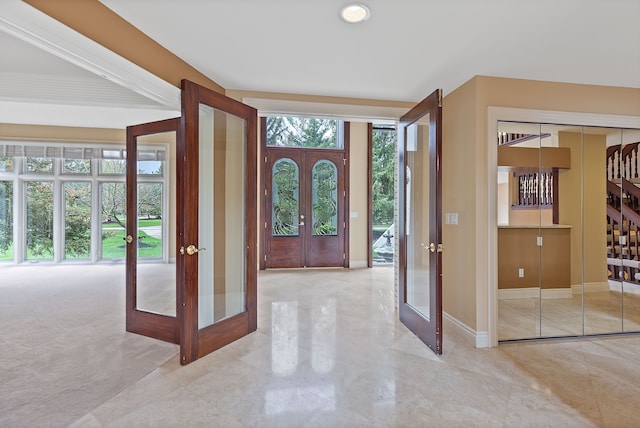 5215 Deer Run Cir, Orchard Lake, MI 48323 - entrance foyer featuring french doors, baseboards, marble finish flooring, and recessed lighting