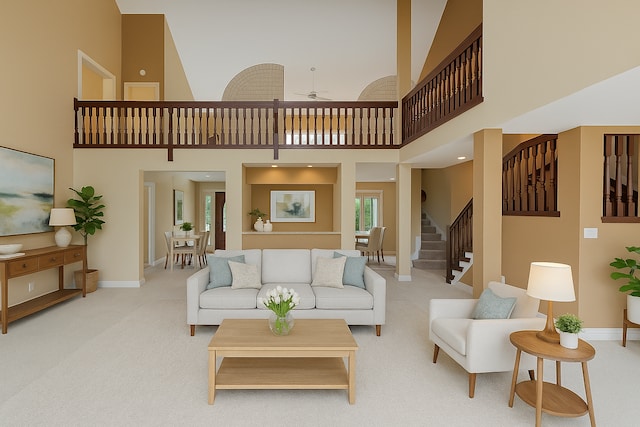 5215 Deer Run Cir, Orchard Lake, MI 48323 - living area featuring a high ceiling, stairs, light colored carpet, a ceiling fan, and baseboards