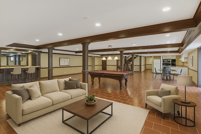 5215 Deer Run Cir, Orchard Lake, MI 48323 - living room with crown molding, pool table, decorative columns, bar, and recessed lighting