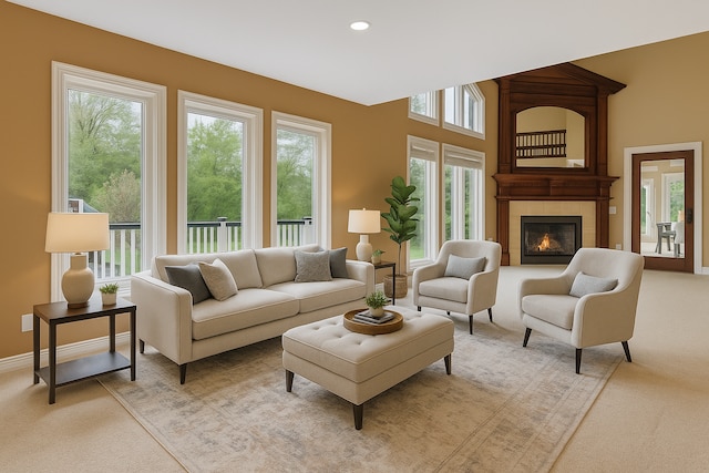 5215 Deer Run Cir, Orchard Lake, MI 48323 - living room with light colored carpet, a large fireplace, recessed lighting, and baseboards