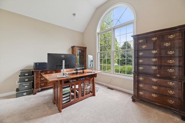 office area featuring baseboards, carpet floors, and high vaulted ceiling