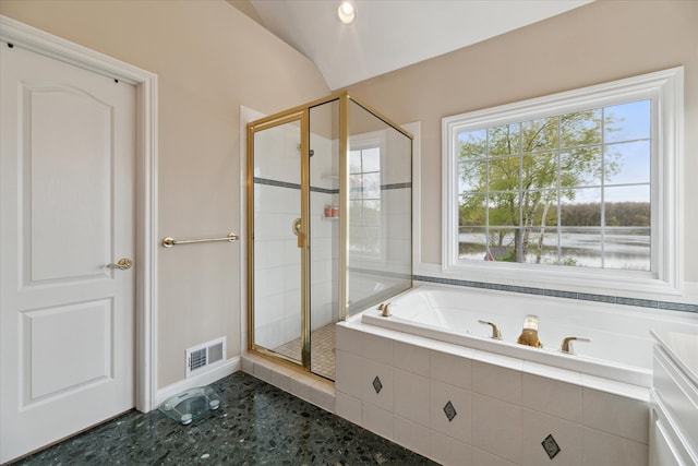 full bath featuring a shower stall, a garden tub, and lofted ceiling