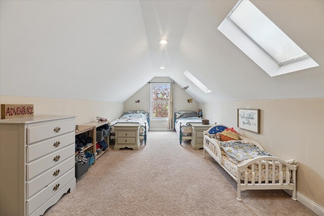 bedroom featuring a skylight, carpet floors, lofted ceiling, baseboards, and recessed lighting