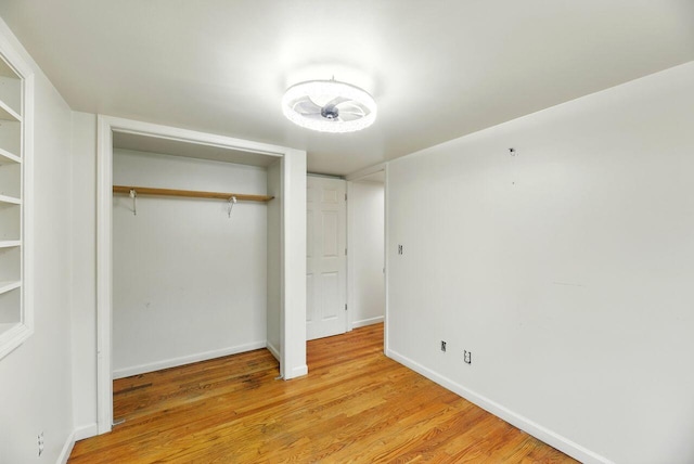 15105 Carpenter Rd, Three Oaks, MI 49128 - unfurnished bedroom featuring a closet, light wood-style floors, and baseboards