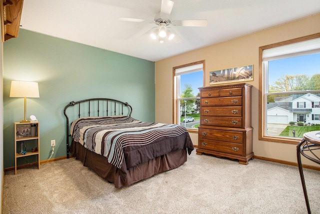 10420 Roger St, Portage, MI 49002 - carpeted bedroom featuring baseboards and ceiling fan