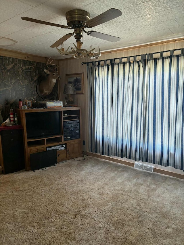 400 E Michigan Ave, Hesperia, MI 49421 - unfurnished living room with carpet flooring and a ceiling fan