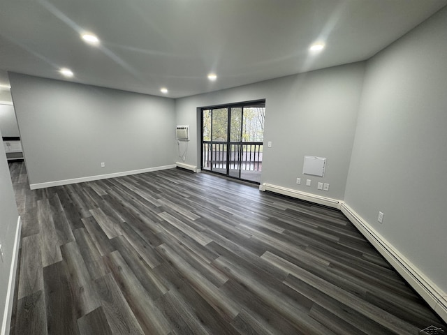 3339 S Cabaret Trl, Saginaw, MI 48603 - unfurnished room featuring dark wood-style flooring, recessed lighting, baseboards, and a wall mounted air conditioner