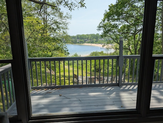 5657 Harding Ave, Muskegon, MI 49442 - deck with a water view and view of scattered trees