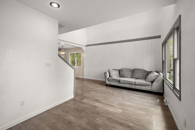 5657 Harding Ave, Muskegon, MI 49442 - living room with a chandelier and wood finished floors