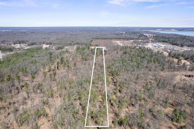 aerial overview of property's location featuring property parcel outlined and a nearby body of water