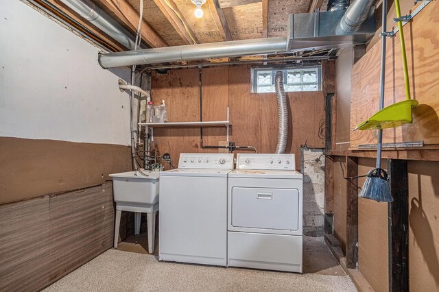 clothes washing area with washer and dryer