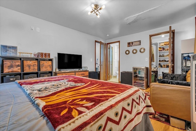 18579 Jeanette St, Southfield, MI 48075 - bedroom with beverage cooler and wood finished floors