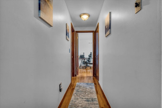 18579 Jeanette St, Southfield, MI 48075 - hallway featuring wood finished floors