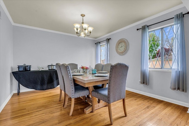 18579 Jeanette St, Southfield, MI 48075 - dining space with a chandelier, light wood-type flooring, baseboards, and ornamental molding