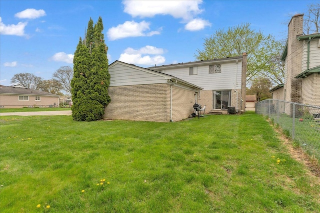 18579 Jeanette St, Southfield, MI 48075 - rear view of house with brick siding and central air condition unit