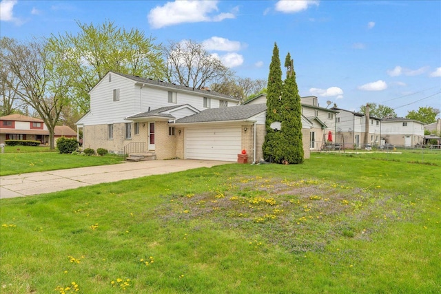 18579 Jeanette St, Southfield, MI 48075 - view of front facade with an attached garage, brick siding, and concrete driveway