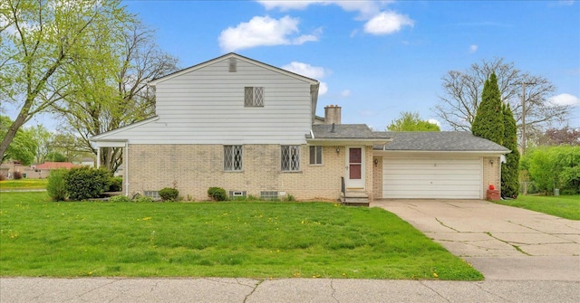 18579 Jeanette St, Southfield, MI 48075 - traditional-style home with brick siding, a garage, driveway, and a front yard