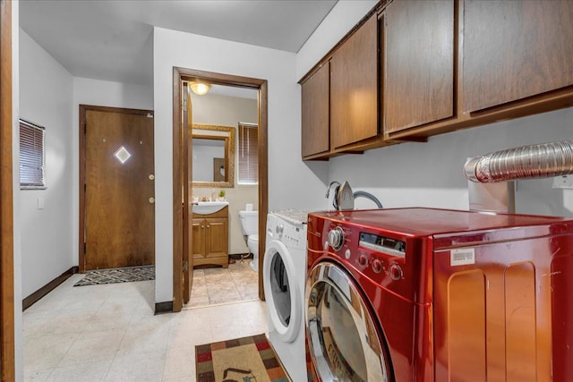 18579 Jeanette St, Southfield, MI 48075 - washroom featuring cabinet space, separate washer and dryer, and baseboards