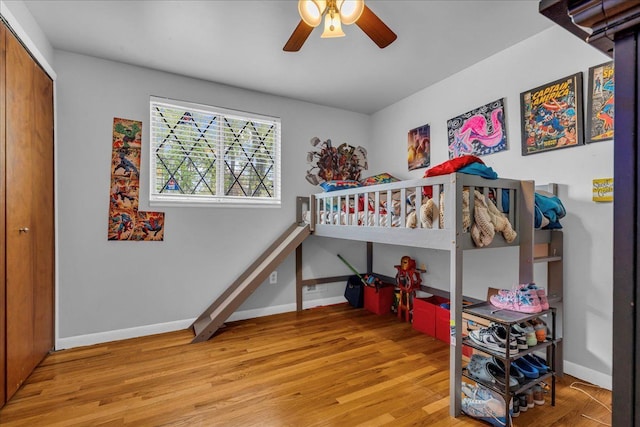 18579 Jeanette St, Southfield, MI 48075 - bedroom featuring wood finished floors, baseboards, a closet, and a ceiling fan