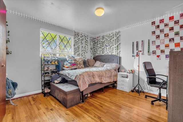 18579 Jeanette St, Southfield, MI 48075 - bedroom featuring wood finished floors, baseboards, and an office area