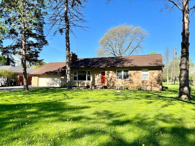 5721 Wright Dr, Troy, MI 48098 - single story home featuring an attached garage, brick siding, a chimney, and driveway