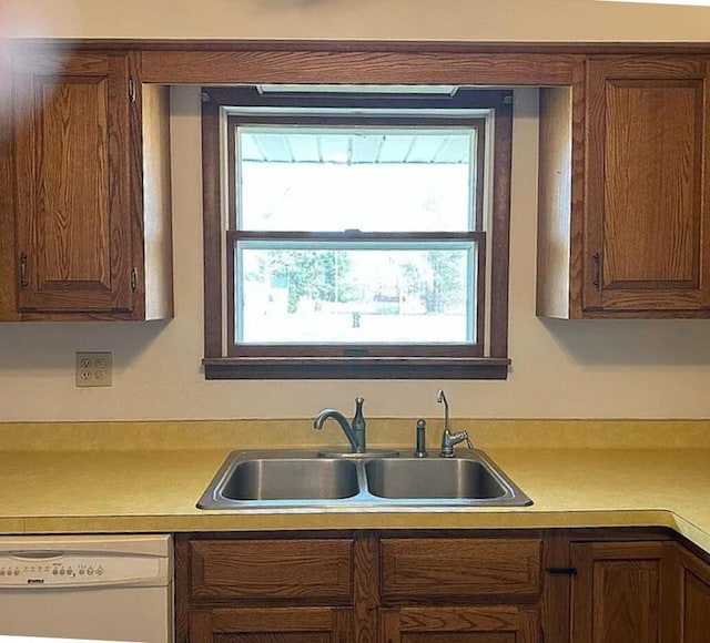 31915 M 60, Leonidas, MI 49066 - kitchen featuring a sink, dishwasher, and light countertops