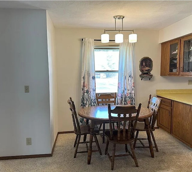 31915 M 60, Leonidas, MI 49066 - dining room featuring light carpet and baseboards