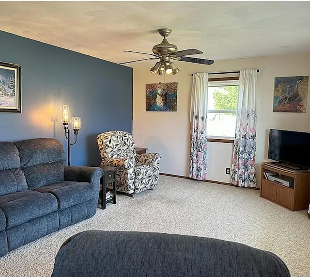 31915 M 60, Leonidas, MI 49066 - living area featuring carpet, ceiling fan, and baseboards