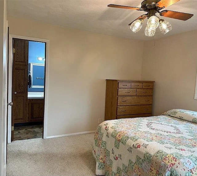 31915 M 60, Leonidas, MI 49066 - bedroom with carpet, baseboards, connected bathroom, and ceiling fan