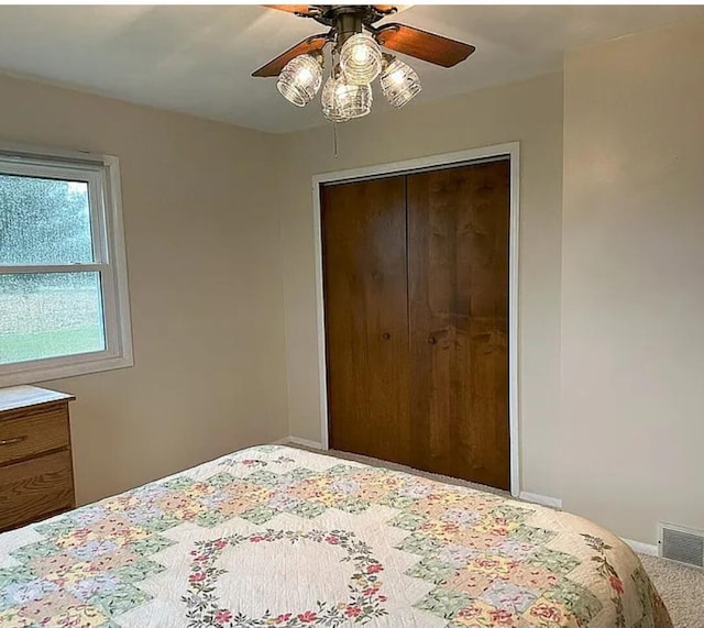 31915 M 60, Leonidas, MI 49066 - bedroom featuring carpet flooring, a closet, ceiling fan, and baseboards