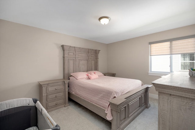 bedroom with light carpet