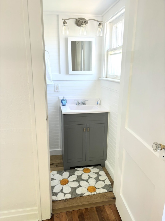 bathroom featuring vanity and wood finished floors