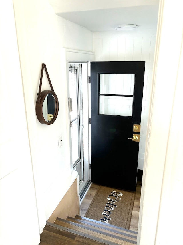 doorway to outside featuring wood finished floors