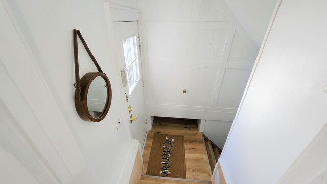 staircase featuring wood finished floors