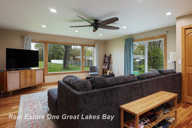 1416 Airfield Ln, Midland, MI 48642 - living room with plenty of natural light, wood finished floors, recessed lighting, and ceiling fan