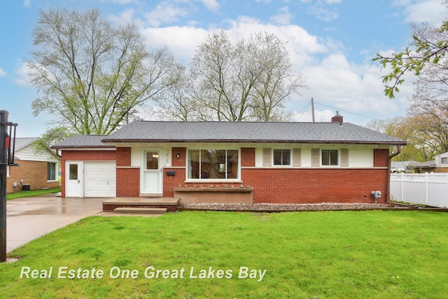 1416 Airfield Ln, Midland, MI 48642 - single story home featuring a garage, brick siding, and driveway