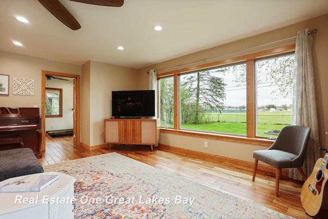 1416 Airfield Ln, Midland, MI 48642 - living room featuring hardwood / wood-style floors, baseboards, recessed lighting, and a ceiling fan